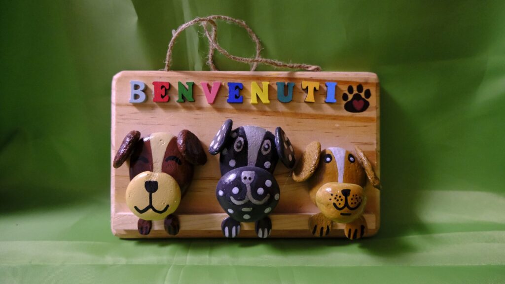 Cartello di benvenuto per porta con cani